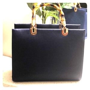 Blue handbag with wood grain handles